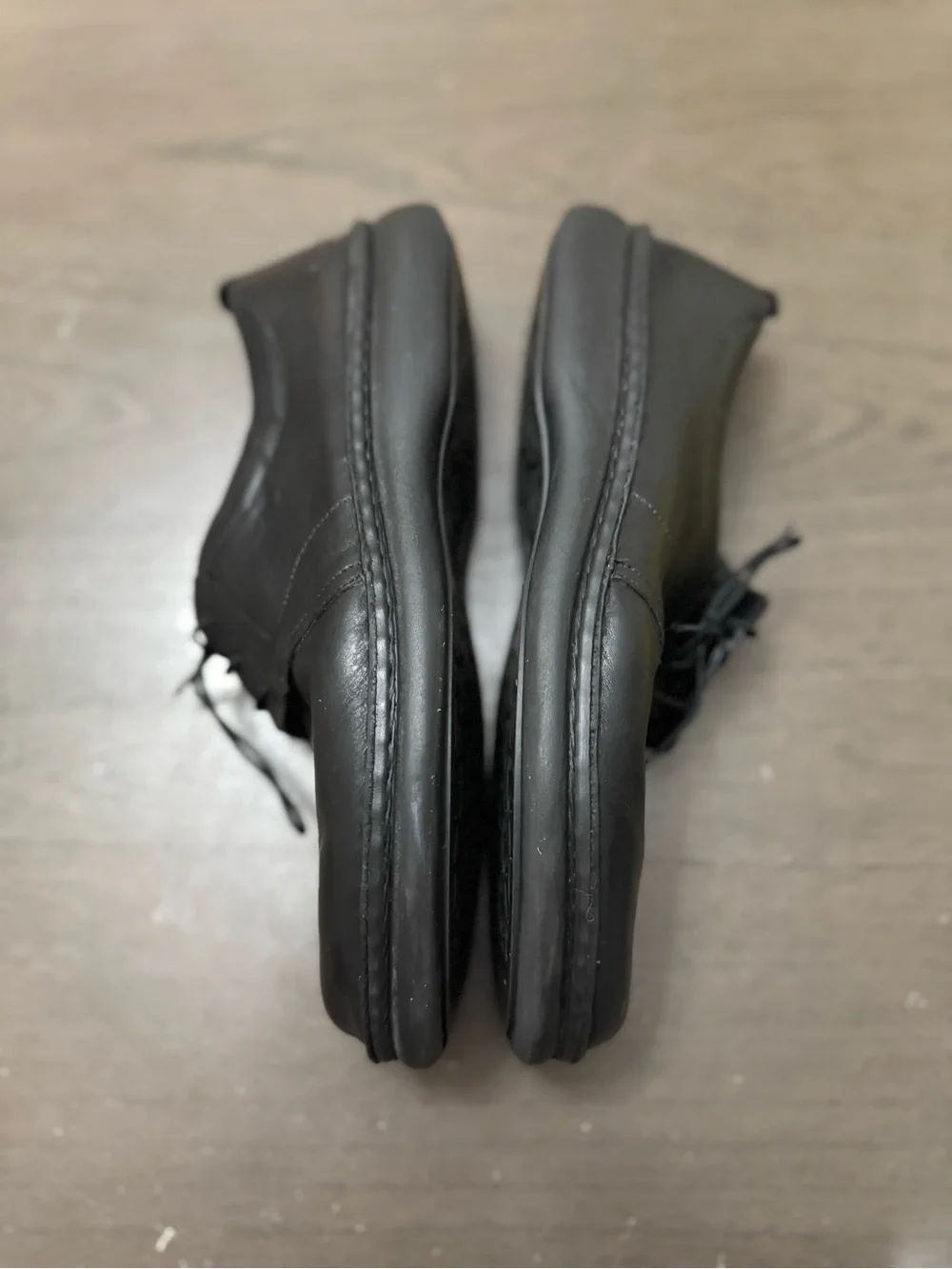 Footprints by Birkenstock mens black leather slip on shoes size EU 45. US 12.